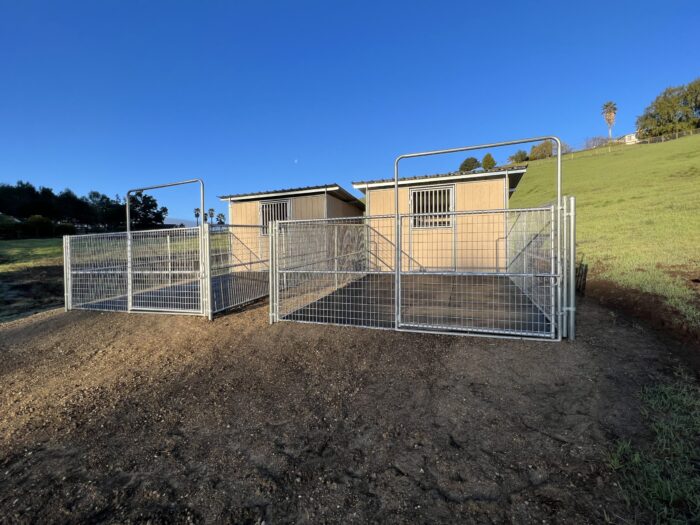 horse shelters with stall fronts and 2x4 mesh panel paddocks built by s c barns